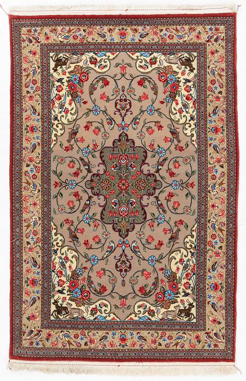 A Ghom rug, c. 160 x 105 cm.