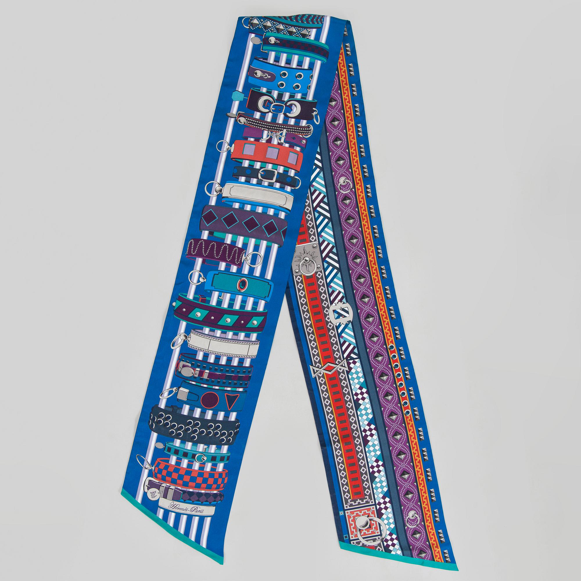 Hermès, a 'Collier de Chiens Maxi Twilly' silk scarf.