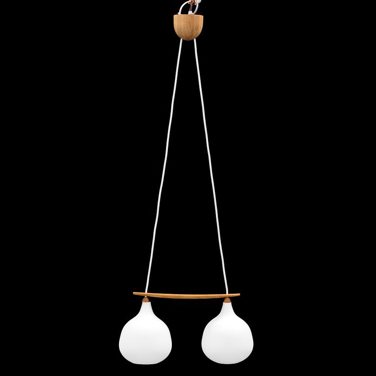 Uno och Östen Kristiansson oak and glass ceiling light from Luxus. Total height ca 103 cm.