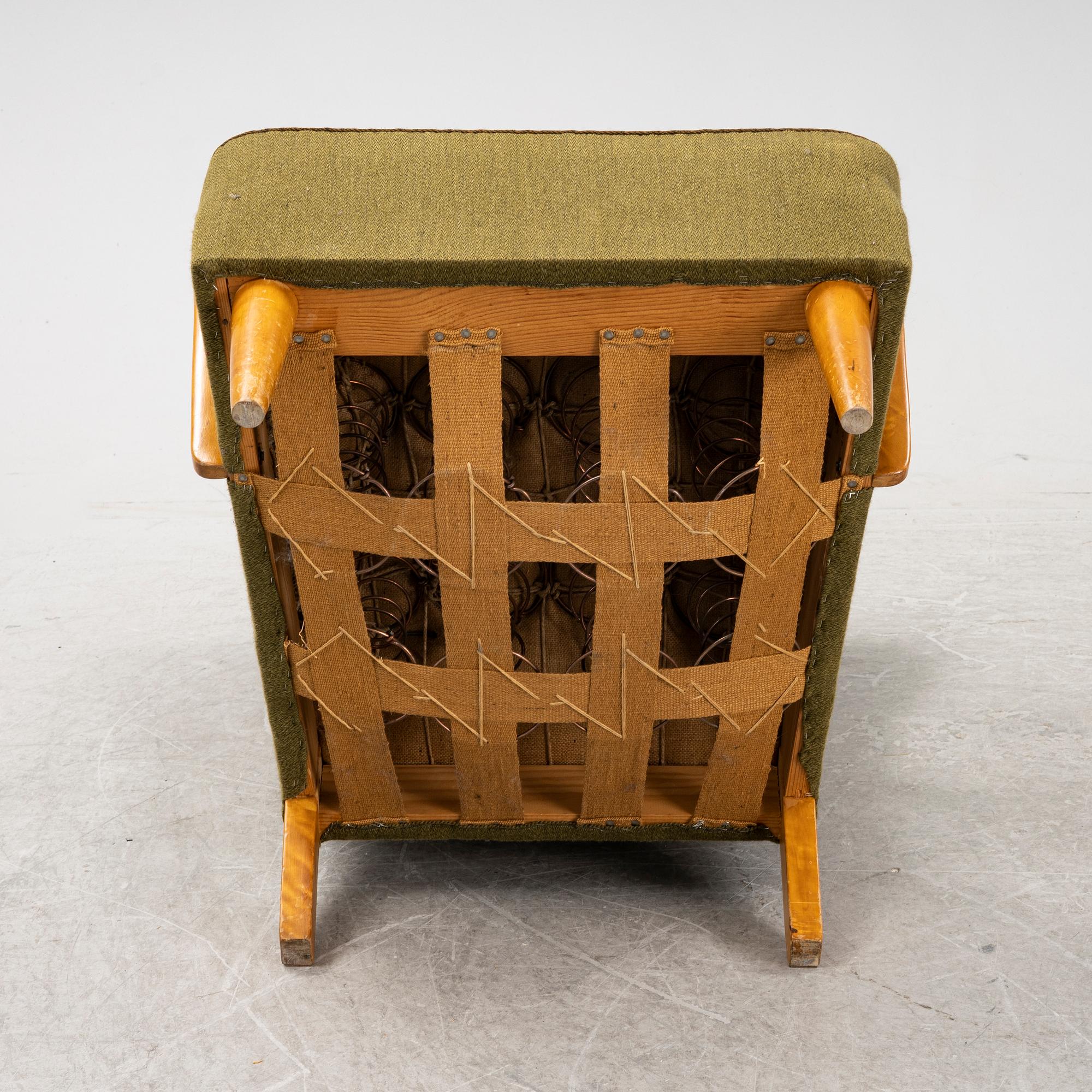 A 1940's wingback armchair.