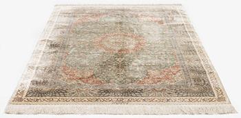 A silk Qum, Central Persia. signed Mohammad Gamshidi, c. 203 x 126 cm.