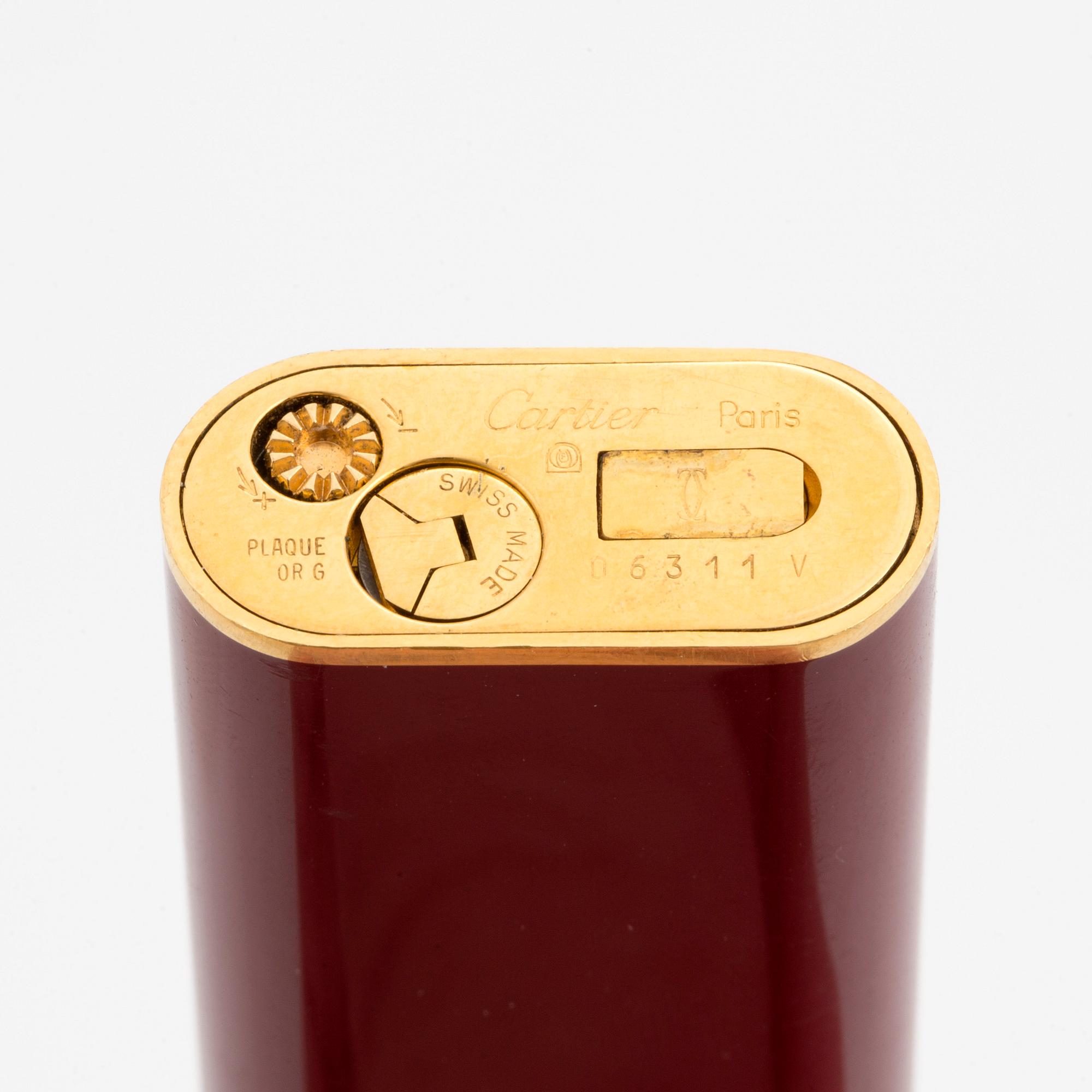 A Cartier lighter and pen.