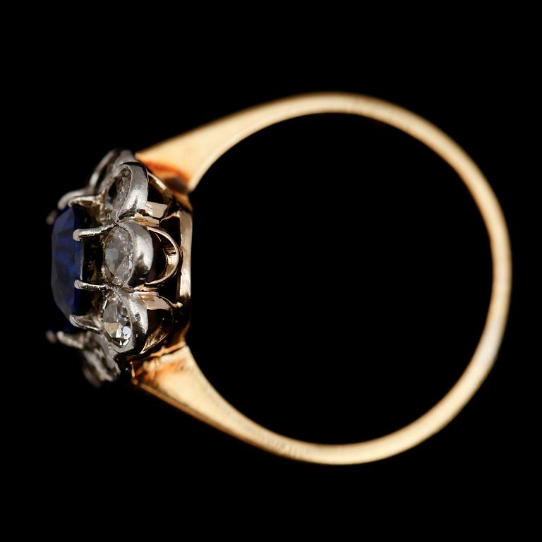 RING, 18 k guld, 10 briljanter totalt 0.90 ct samt syntetisk safir.