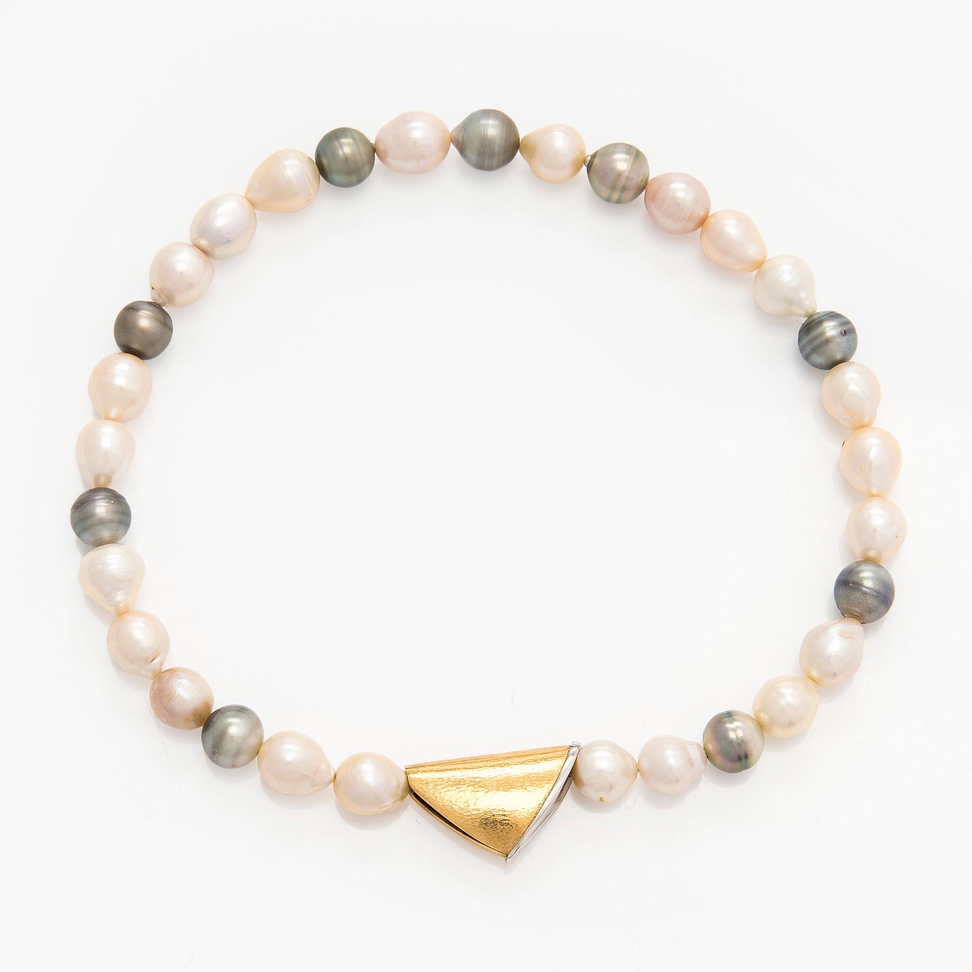 Ole Lynggaard, A cultured pearl necklace, clasp in 18K gold with a round brilliant-cut diamond.