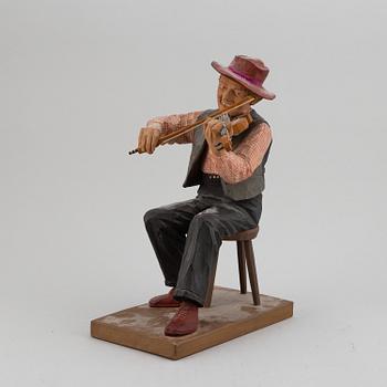 HERMAN ROSELL, a painted wooden sculpture.