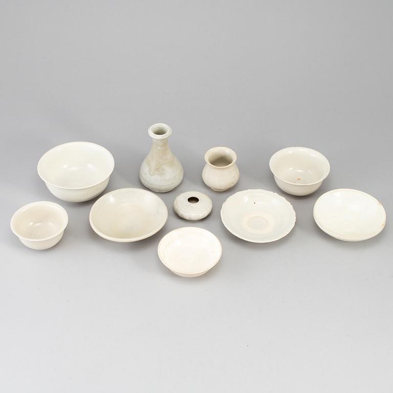 A group of 10 white glazed song style ceramics, South East Asia.