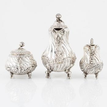 A Spanish Silver Rococo-Style Coffee Pot, Creamer and Sugar Bowl, first half of the 20th Century.