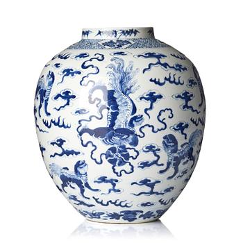 1184. A blue and white 'buddhist' lion jar, Qing dynasty, 19th century.