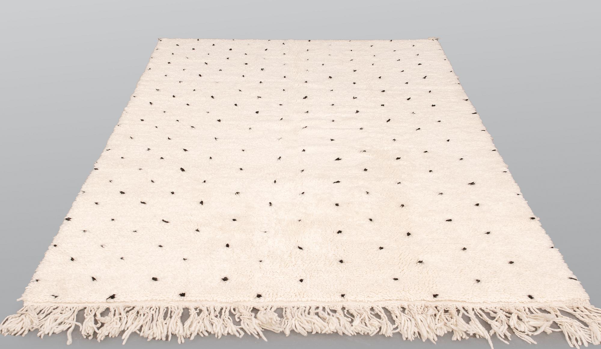 A Moroccan carpet, 254 x 160 cm.