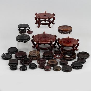 31 Chinese wooden stands of different sorts, 20th century.