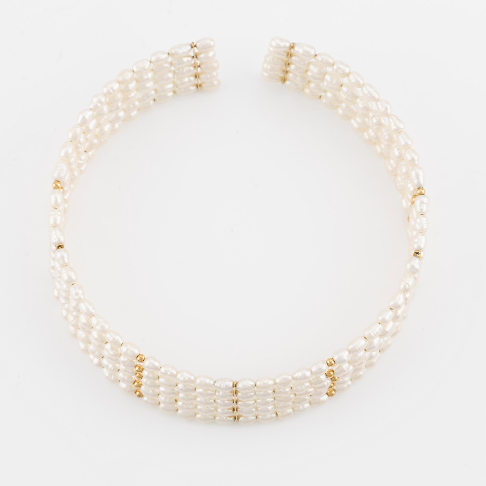 Five-row collar/choker with cultured freshwater pearls and 14K gold beads.