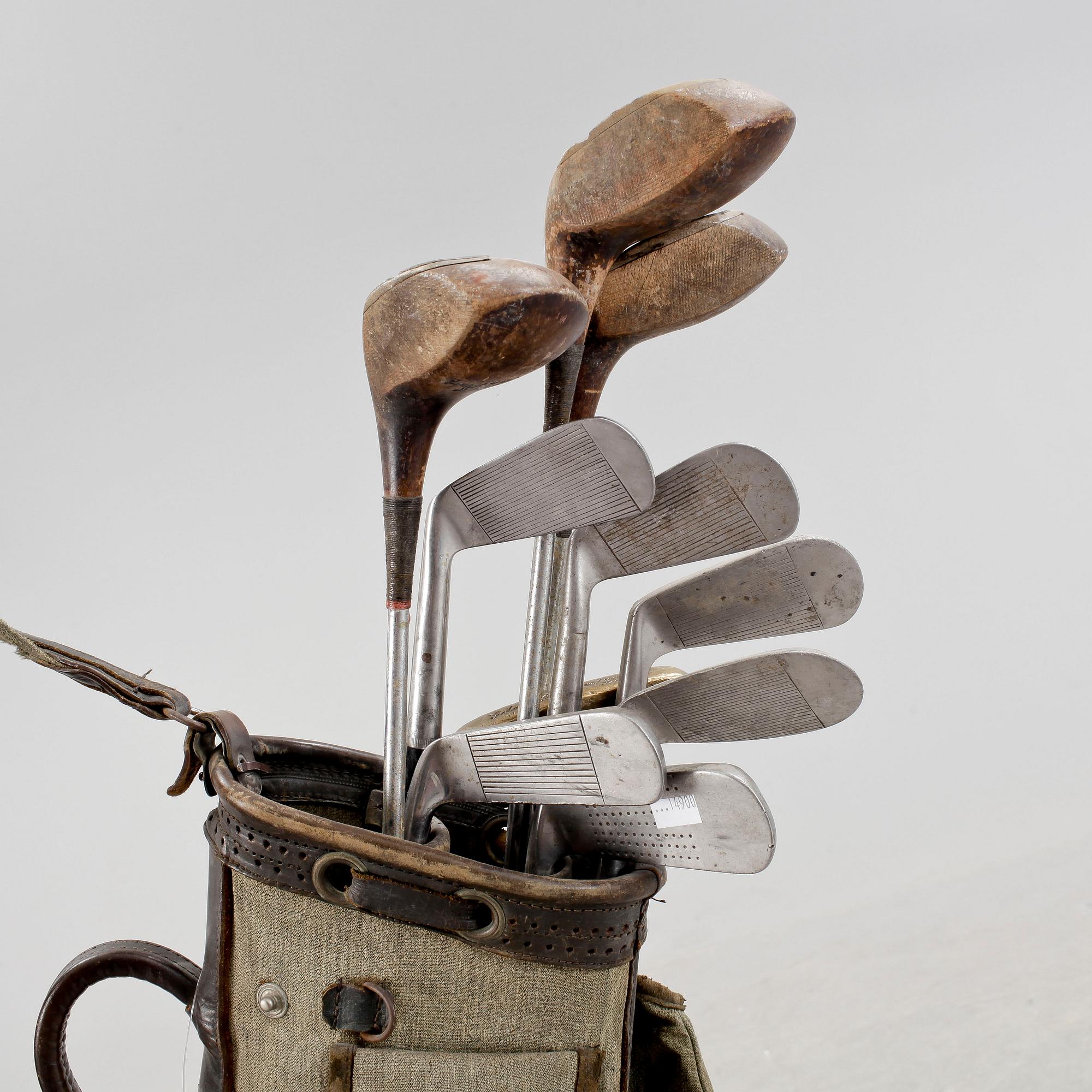 GOLFKLUBBOR, 10 st, i bag, 1900-tal.