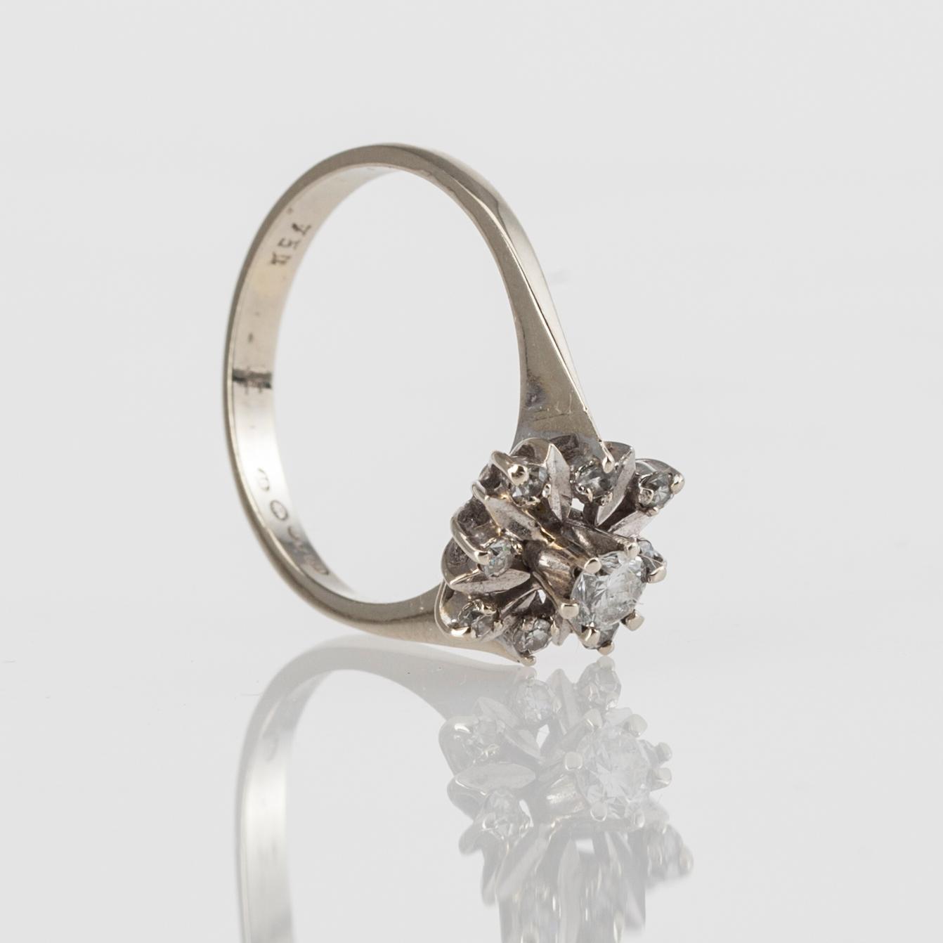 RING, 18K guld, 8+1 st diamanter, tot. ca 0,25 ct. N. Westerback 1973. Vikt ca 2,9 g.