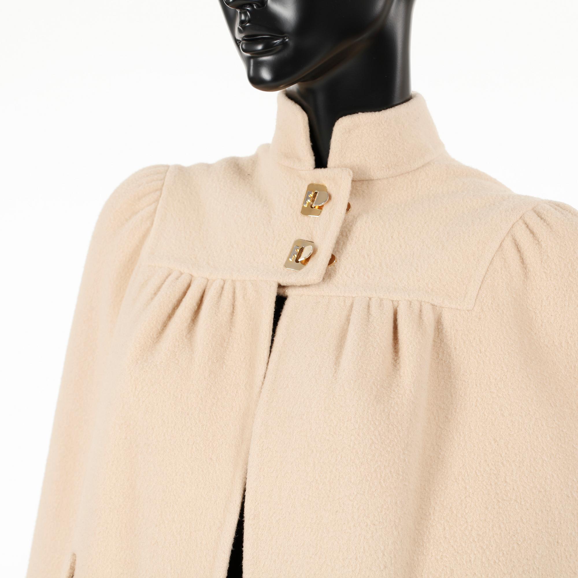SALVATORE FERRAGAMO, a beige wool cape.