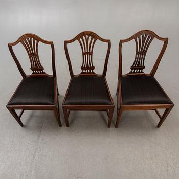 A set of six mahogany Hepplewhite style 20th century chairs.