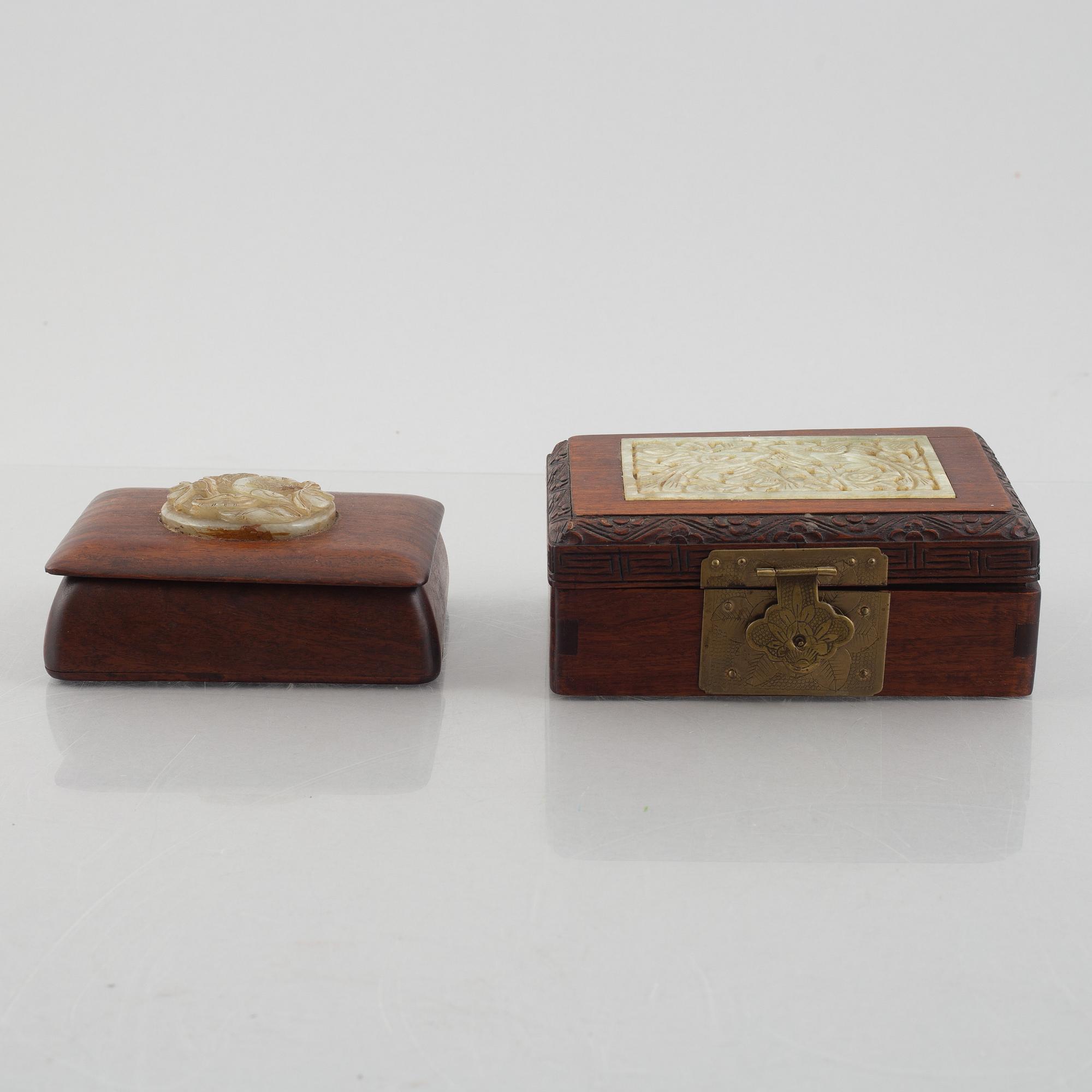 Two Chinese hardwood boxes with nephrite plaques, 20th century.