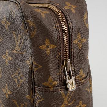 A Louis Vuitton "Trousse Toilette 28" beauty bag.