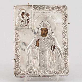 A Russian icon, with silver oklad, DN Dubinin (active 1849-54), St Petersburg.