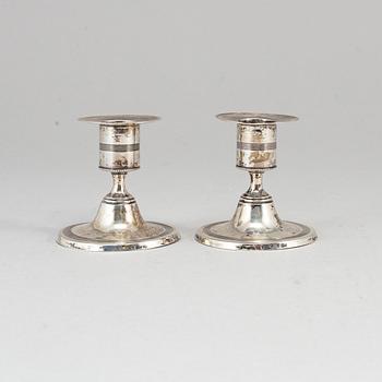 A pair of Swedish small early 19th century silver candle sticks, mark of Pehr Zethelius, Stockholm 1805.