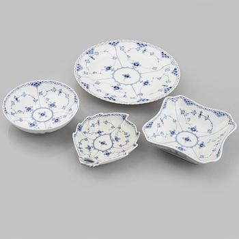 Royal Copenhagen, a 116-piece 'blue Fluted' porcelain dinner and coffee service, half lace, Denmark, mostly 1923-34.