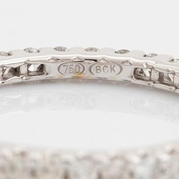 Brilliant-cut diamond eternity ring.