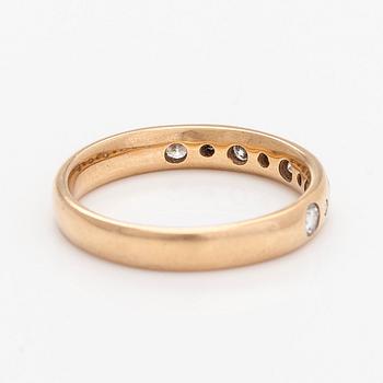 A 14K gold half eternity ring, set with brilliant-cut diamonds, total approximately 0.26 ct. Finnish import marks  1997.