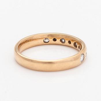 A 14K gold half eternity ring, set with brilliant-cut diamonds, total approximately 0.26 ct. Timanttiset, Helsinki 1997.