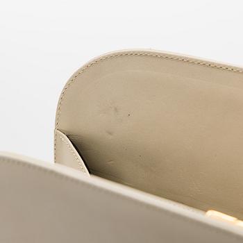 Salvatore Ferragamo, a leather “Gancini”bag.