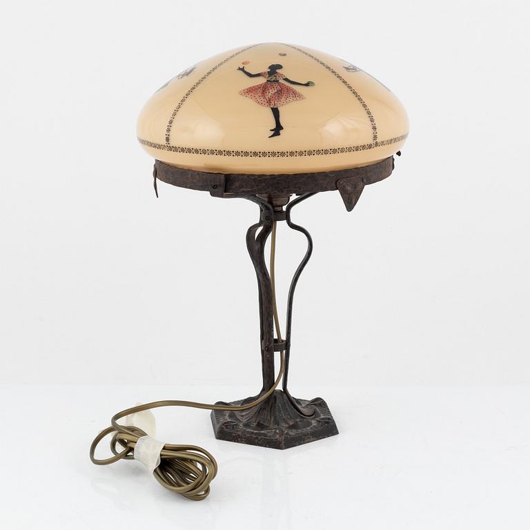 An iron table lamp, early 20th Century.