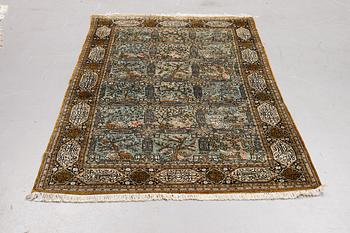 A rug, Old silk Qum, figural,  ca 214 x 142 cm.