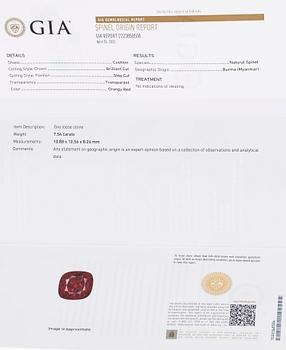 A platinum ring with spinel and brilliant cut diamonds.