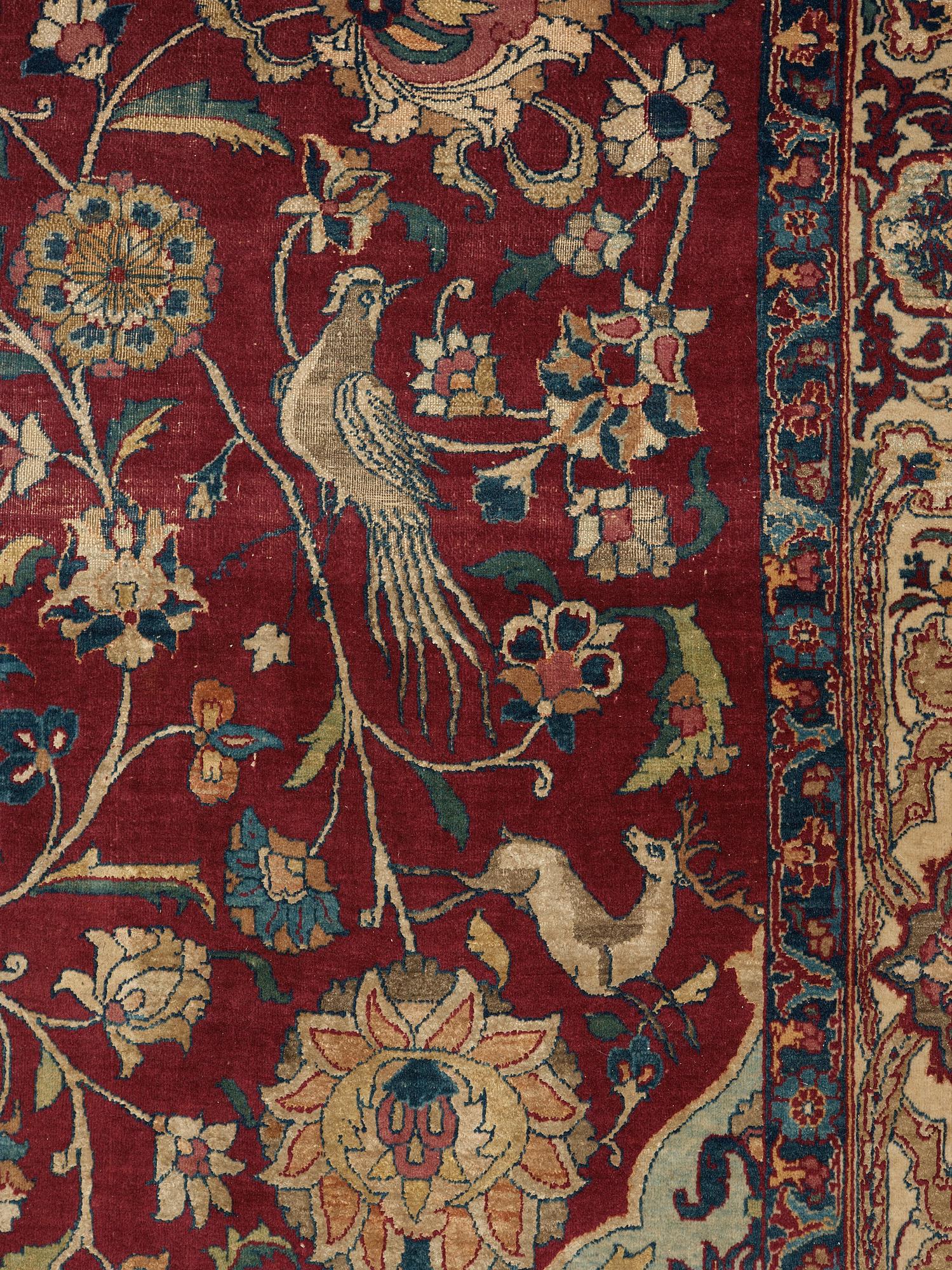 A CARPET, A semi-antique Esfahan part silk, ca 350,5 x 233,5 cm.