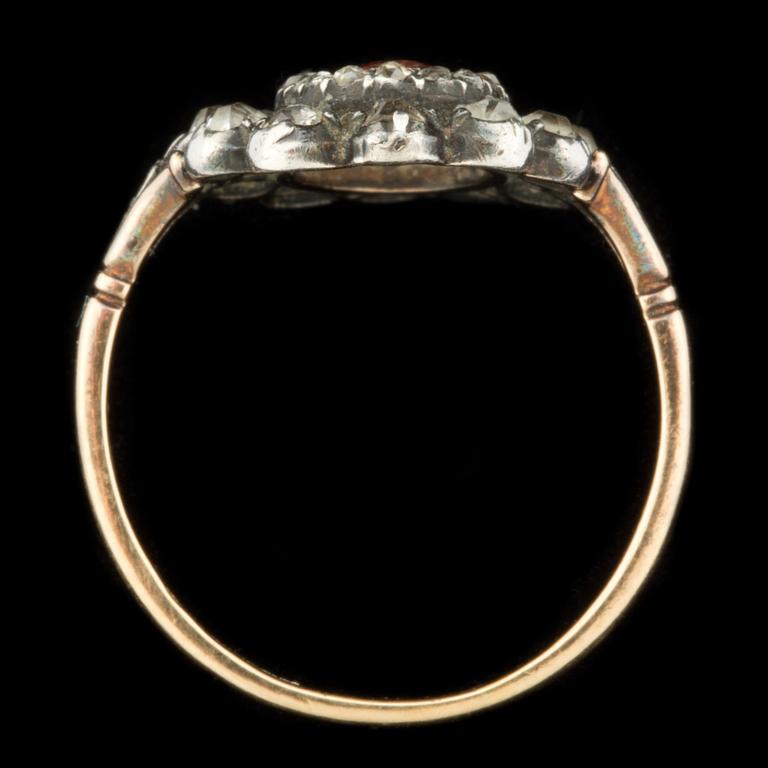 A topaz and rose-cut diamond ring. Made by W.A Bolin jeweller to the Swedish court, Stockholm 1928.