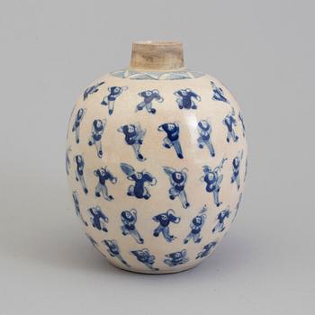 A blue and white porcelain jar, circa 1900.