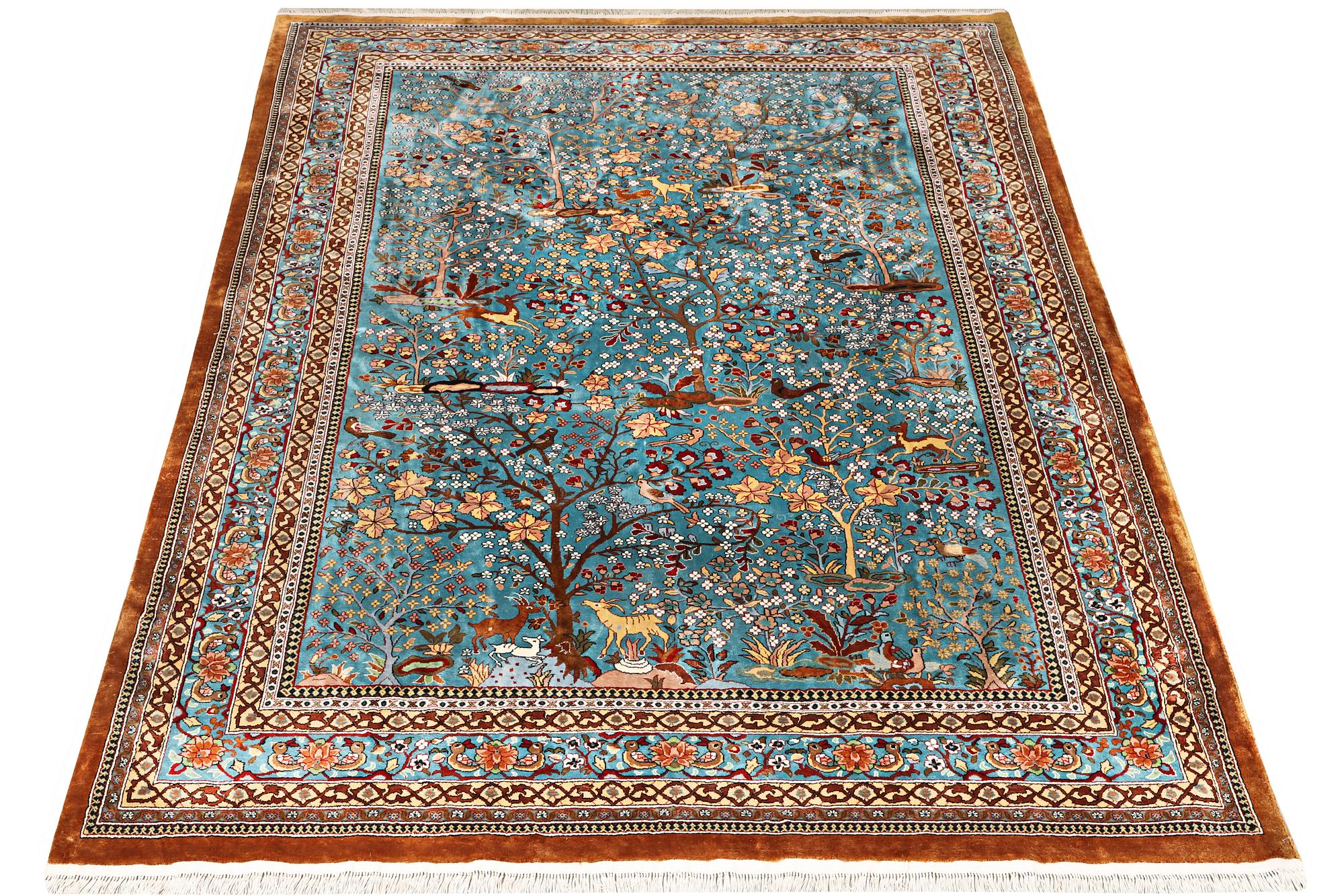An all silk oriental carpet, a. 280 x 185 cm.