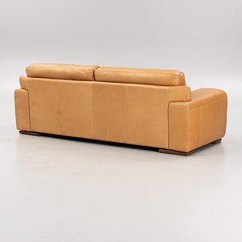 A leather upholstered sofa from Natuzzi.