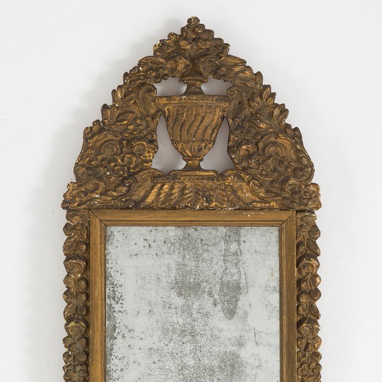 AN 18TH CENTURY MIRROR, probably French.