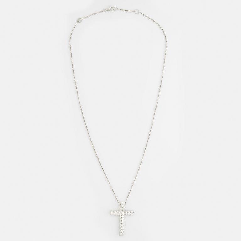 Brilliant cut diamond cross necklace.