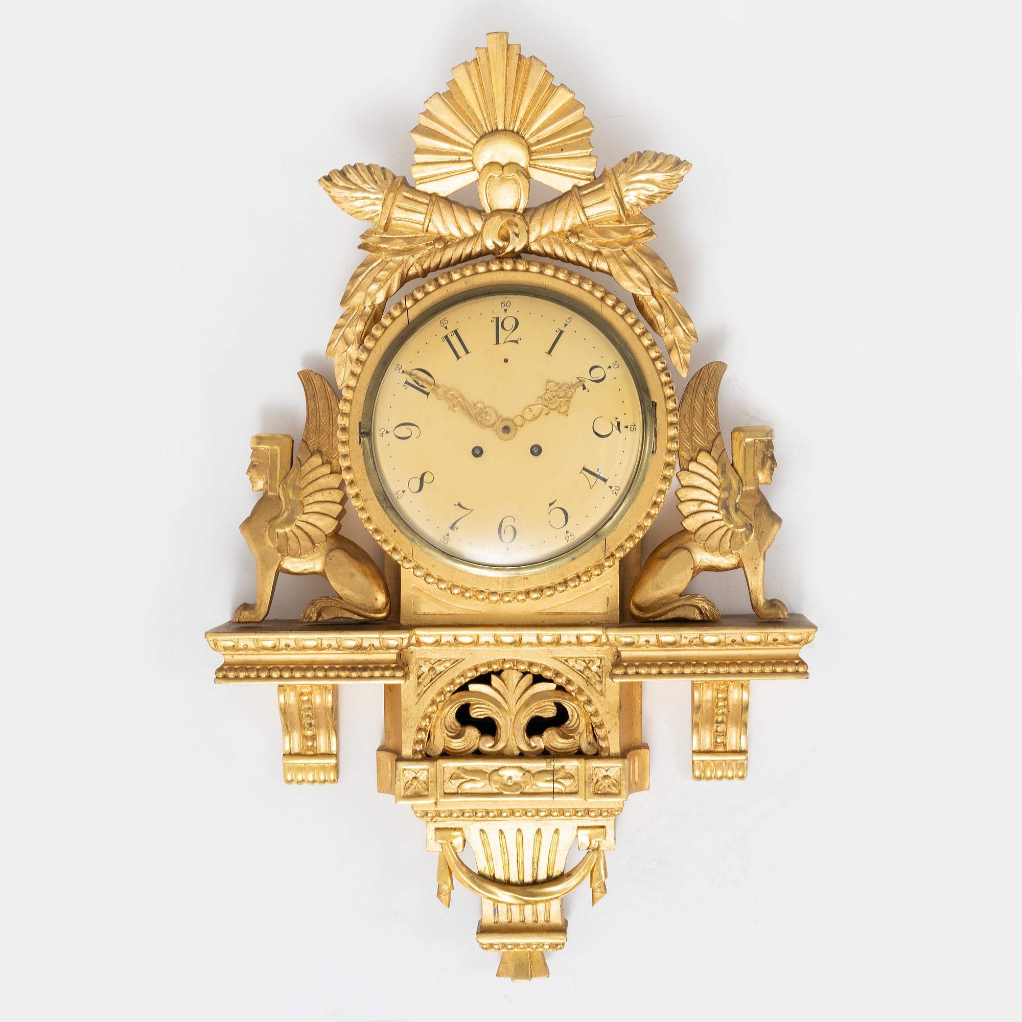 An Empire style wall clock, mid 20th century.