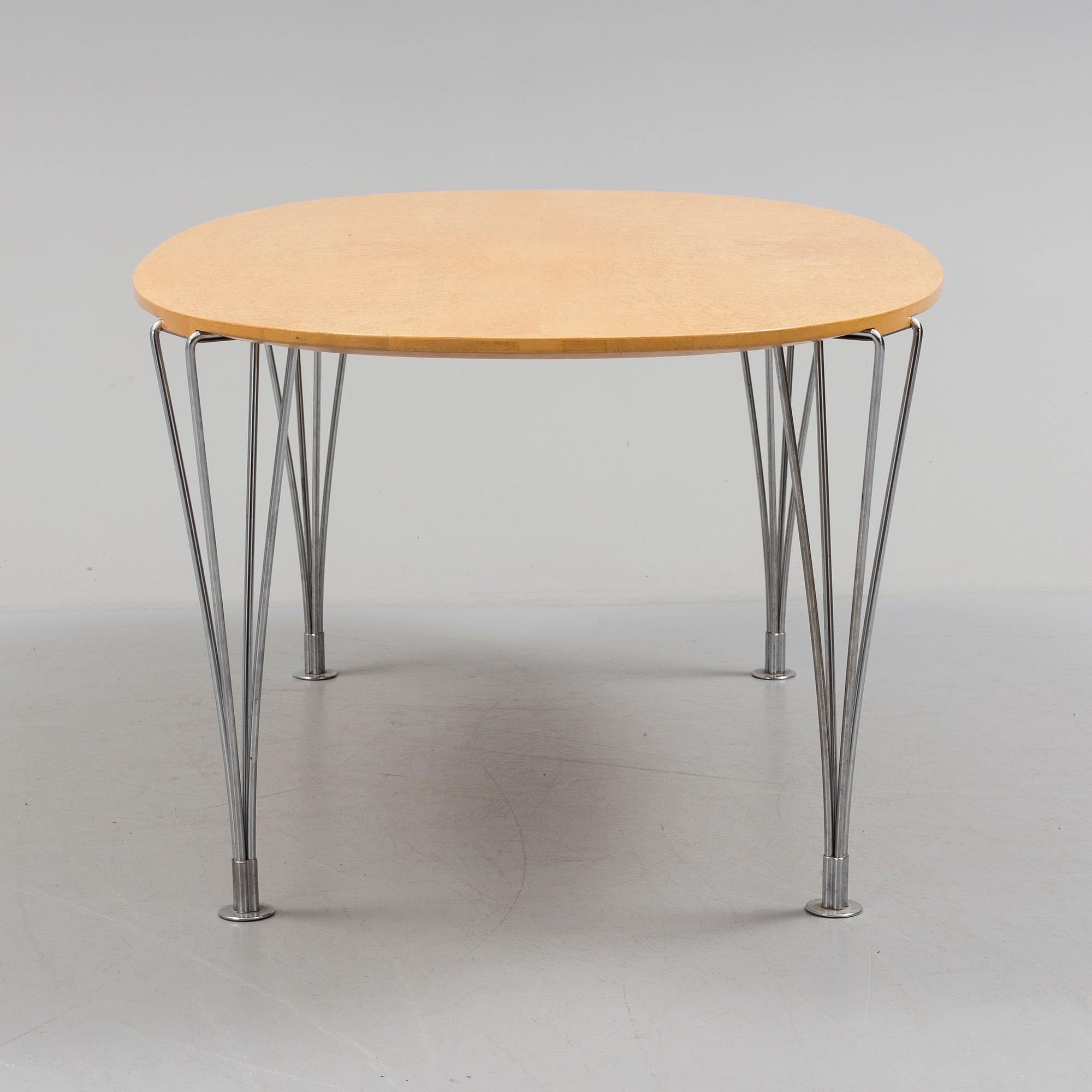 A "Superelips" table by Bruno Mathsson and Piet Hein, 20th century.