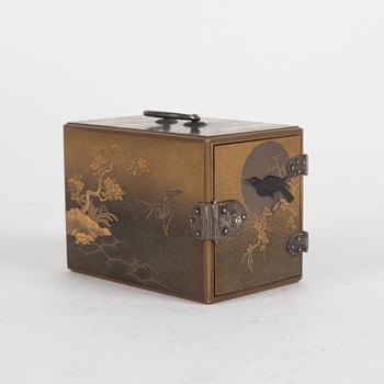 A Japanese lacquer box with three small drawers. Meiji.