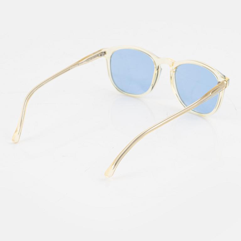 Illesteva, a pair of sunglasses.