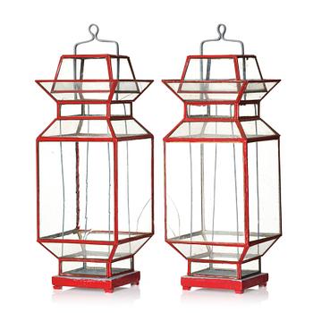 1028. A pair of Chinese glass and metal lanterns, second half of the 20th century.