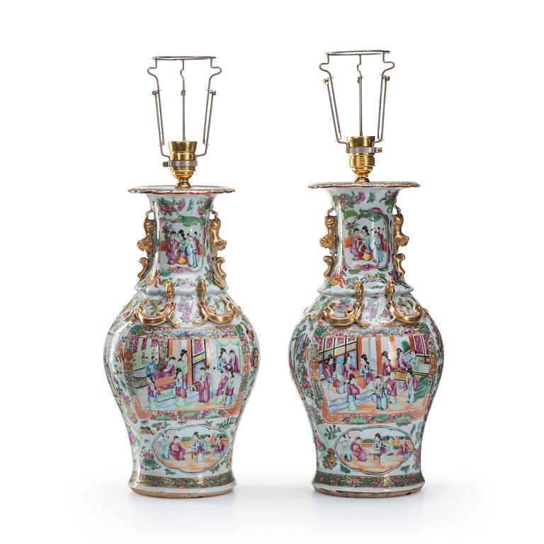 A pair of famille rose Canton vases made in to lamps, Qing dynasty, 19th Century.