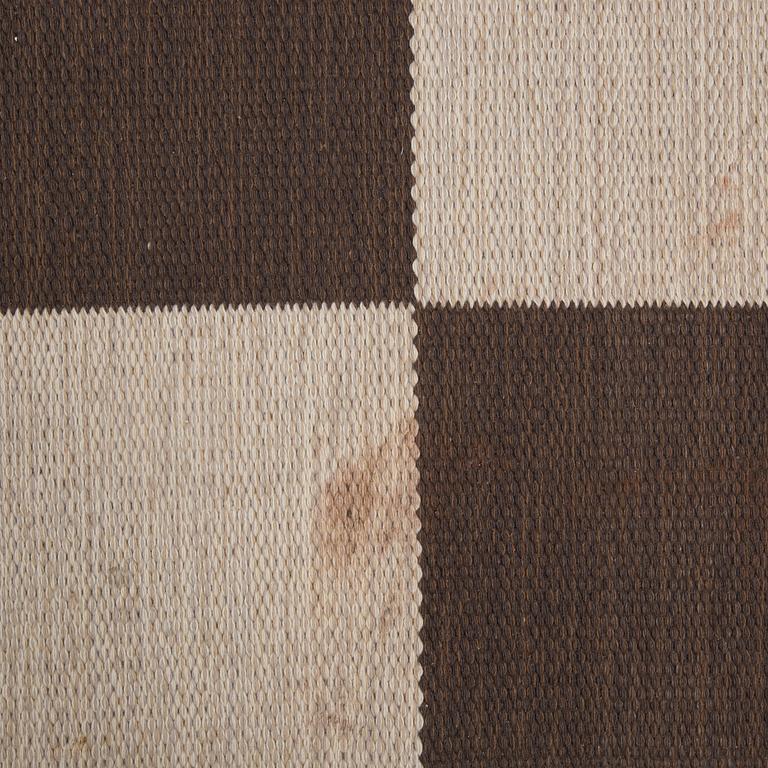 A machine woven runner, "Arkad Checkerboard", Gunilla Lagerhem-Ullberg, Kasthall, 242 x 82 cm.