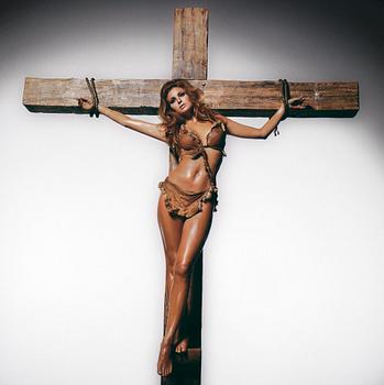 328. Terry O'Neill, "Raquel Welch on the Cross, Los Angeles, 1970".