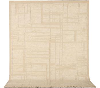 A relief-cut Moroccan carpet, c. 321 x 251 cm.