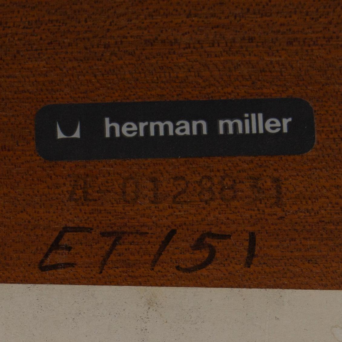 CHARLES AND RAY EAMES, a mahogany veneered table, Herman Miller.