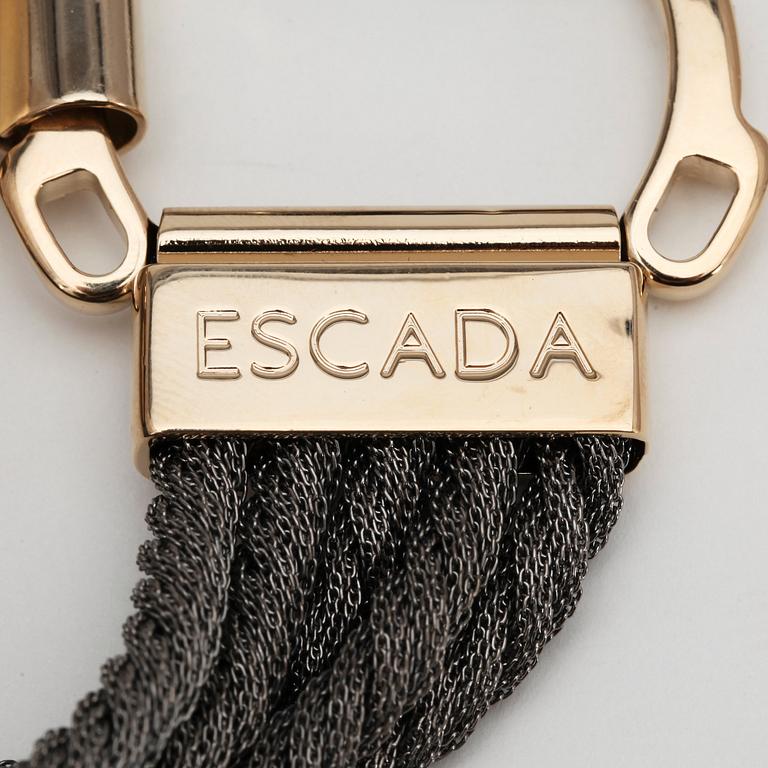 ESCADA, a bracelet with metal ties.