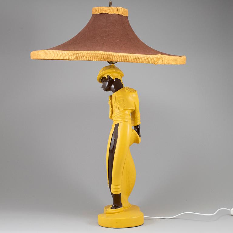 A ceramic table lamp, signed 1951.